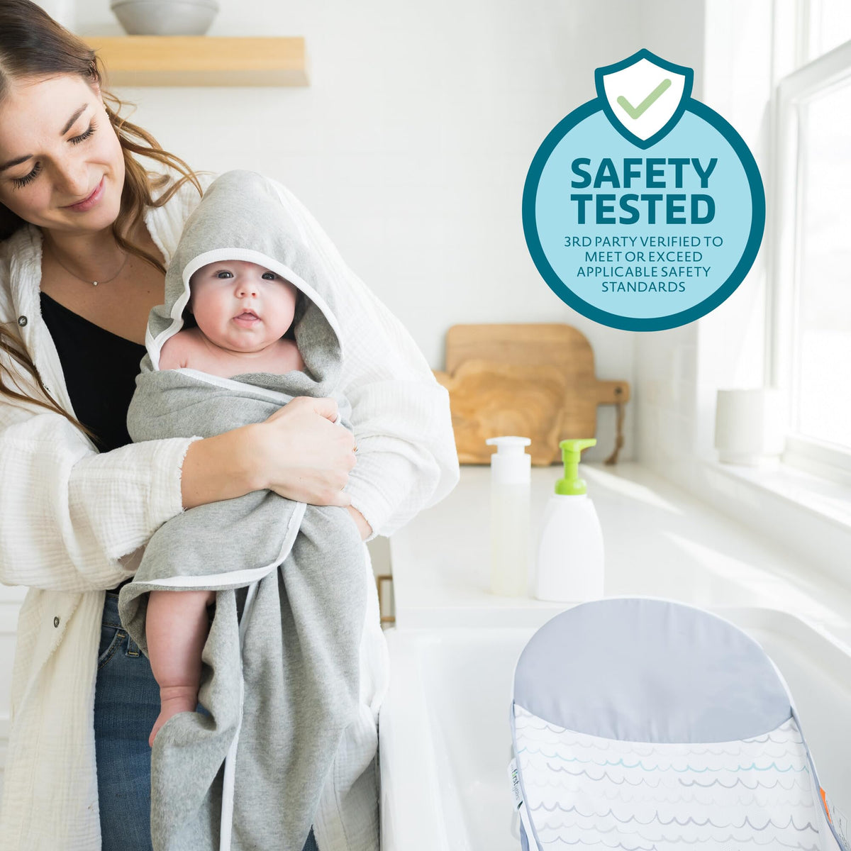 The First Years Sure Comfort Folding Baby Bather - Baby to Toddler Bath Tub - No-Slip Seat - for Sink or Tub Use